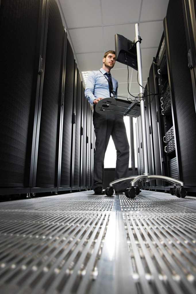 Computer technician working on a server